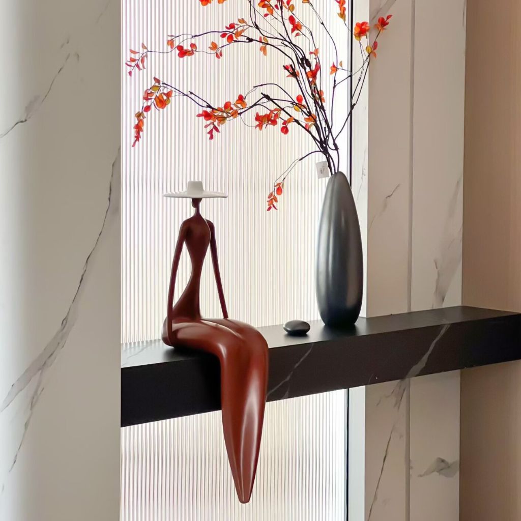 Hepburn Sitting Figure Sculpture