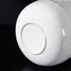 Lorito Sculptural Embossed Ceramic Vase